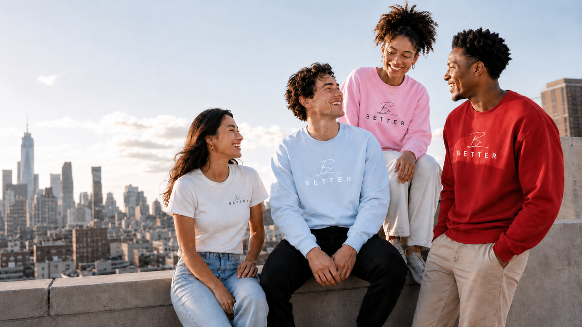 Friends wearing Project Be Better apparel on a rooftop